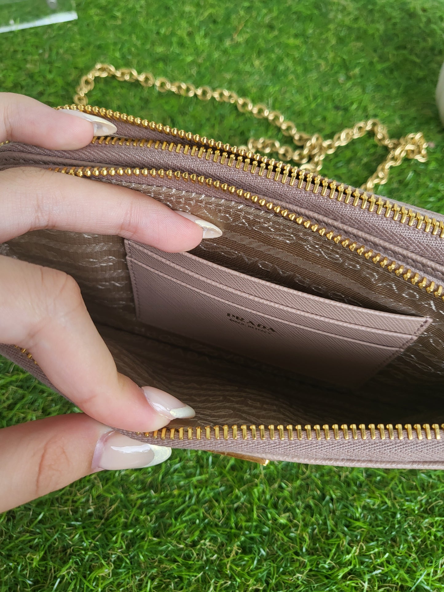 Prada Double Zip wallet on chain