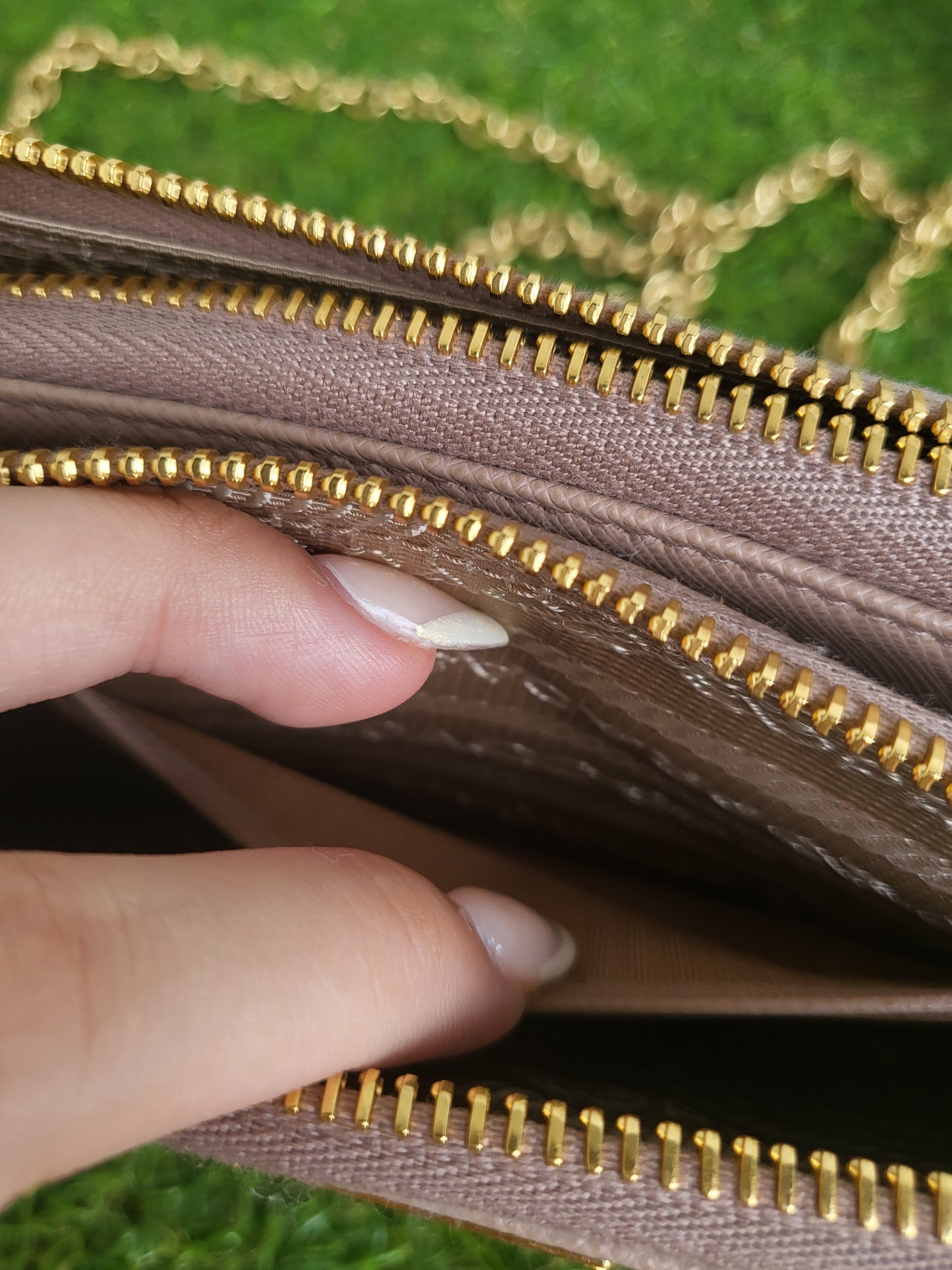 Prada Double Zip wallet on chain