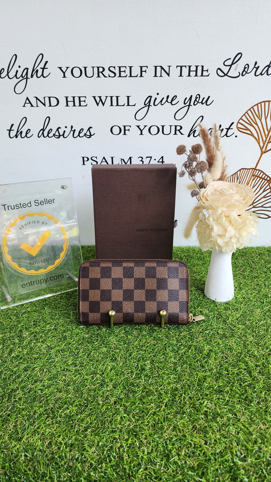 LOUIS VUITTON MEDIUM ZIPPY