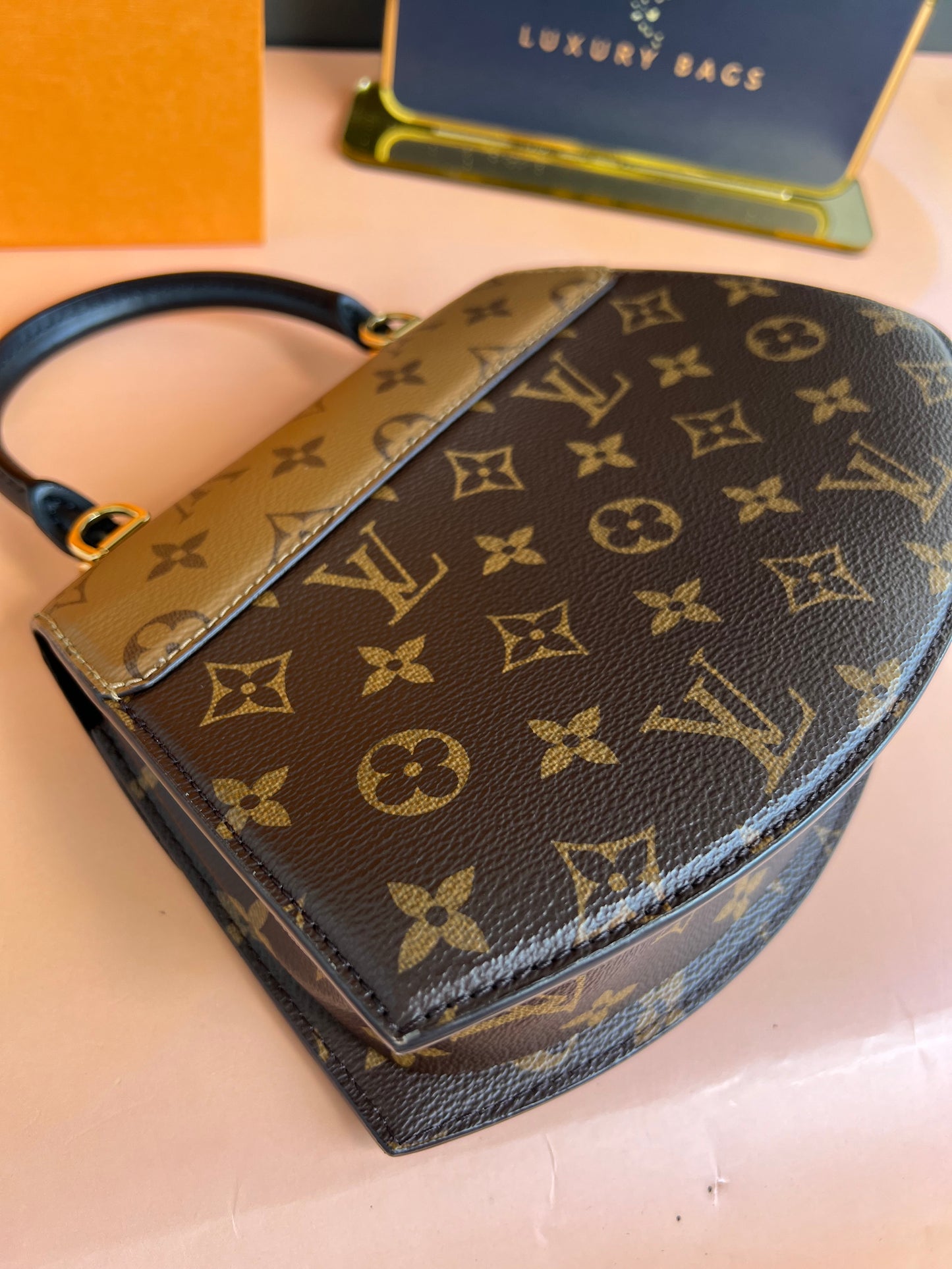 LOUIS VUITTON TILSITT REVERSE MONOGRAM