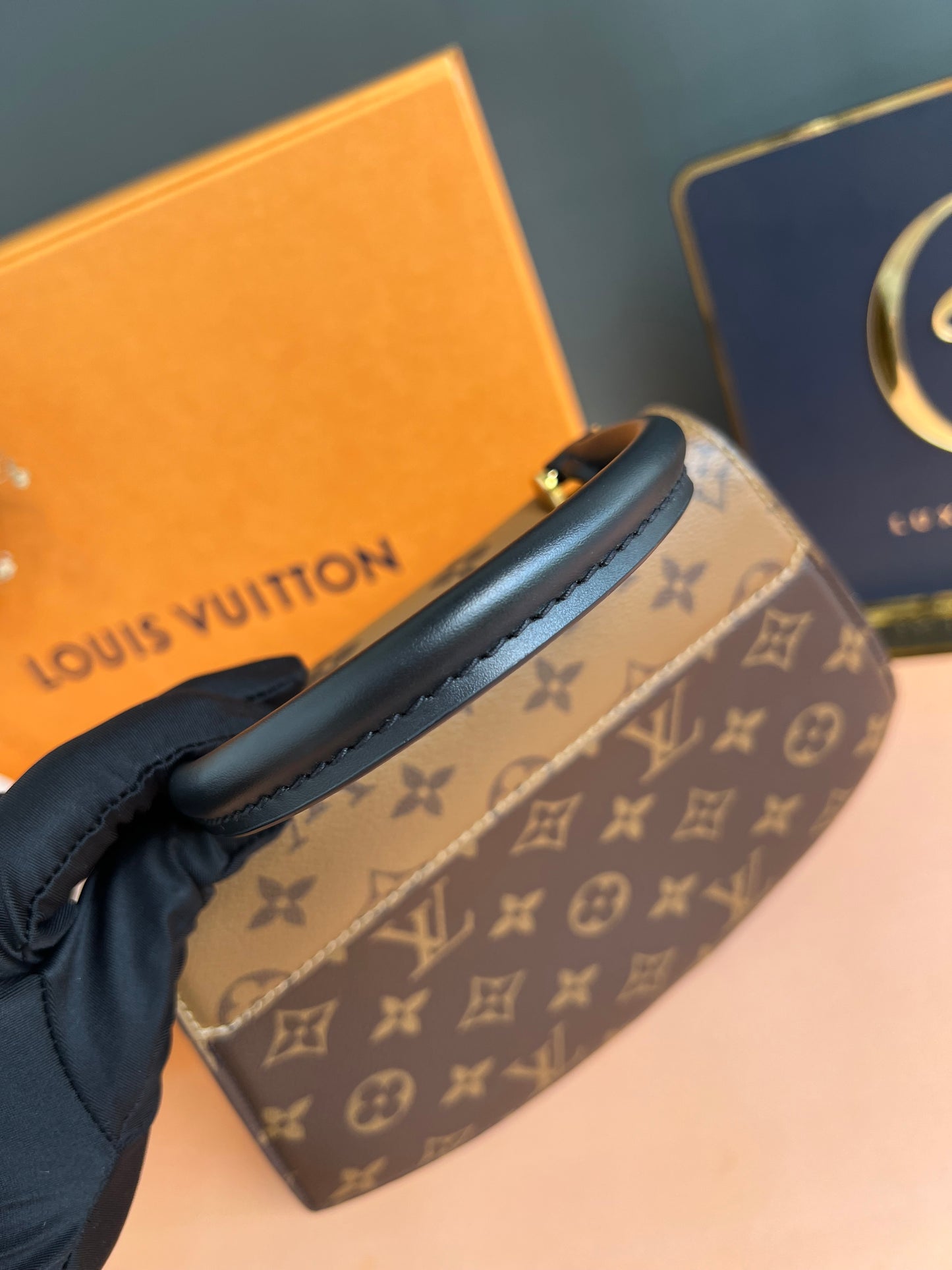 LOUIS VUITTON TILSITT REVERSE MONOGRAM