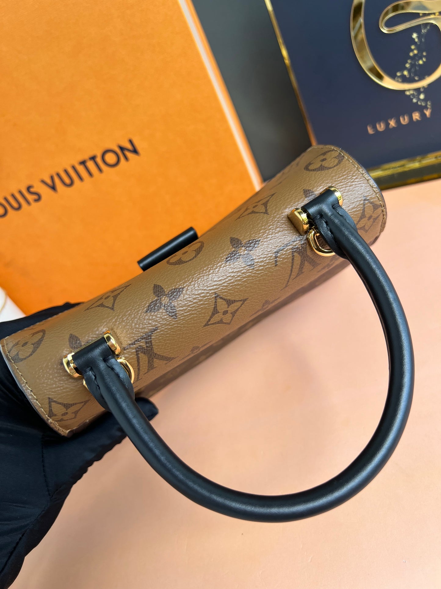 LOUIS VUITTON TILSITT REVERSE MONOGRAM