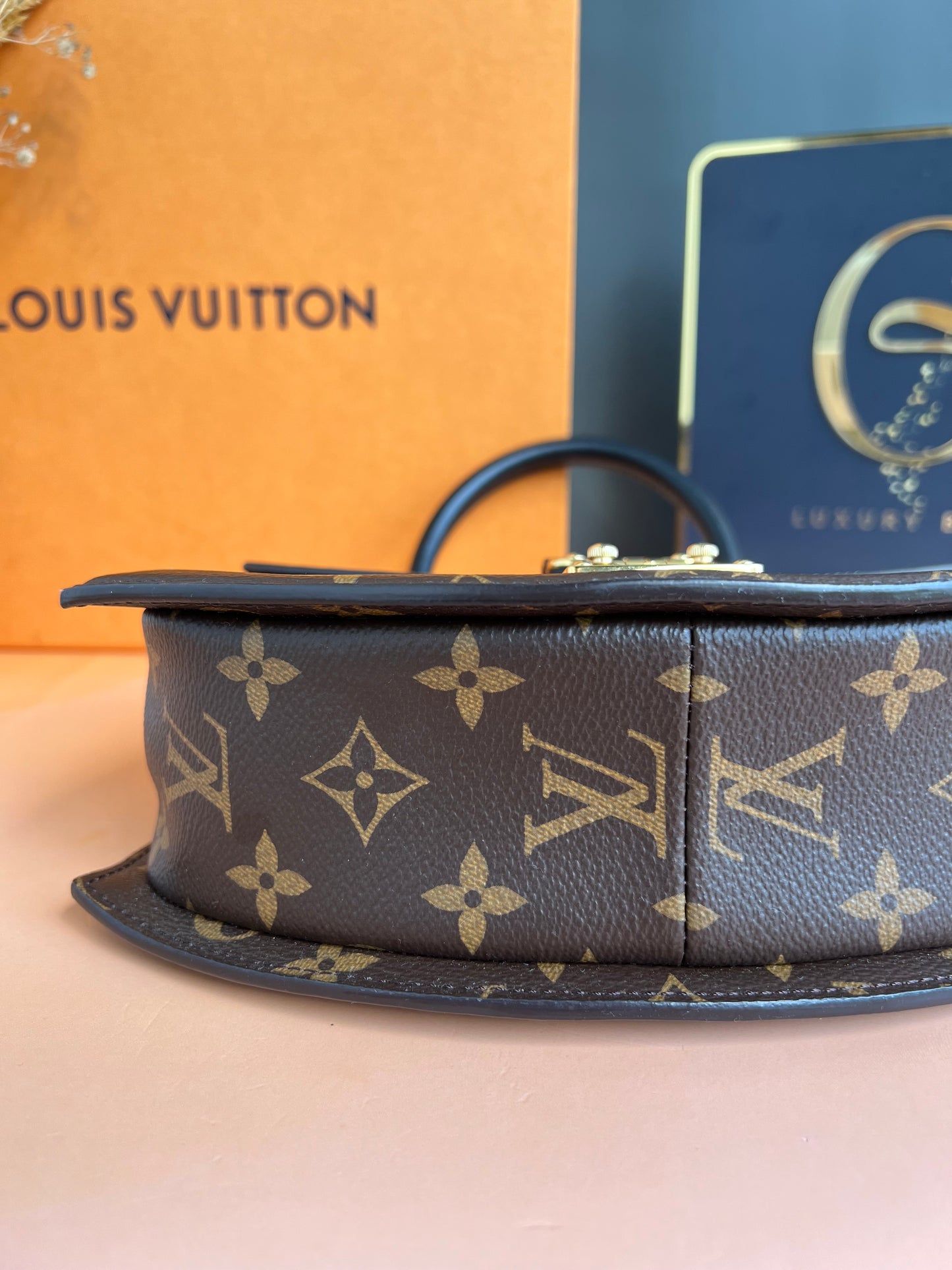 LOUIS VUITTON TILSITT REVERSE MONOGRAM