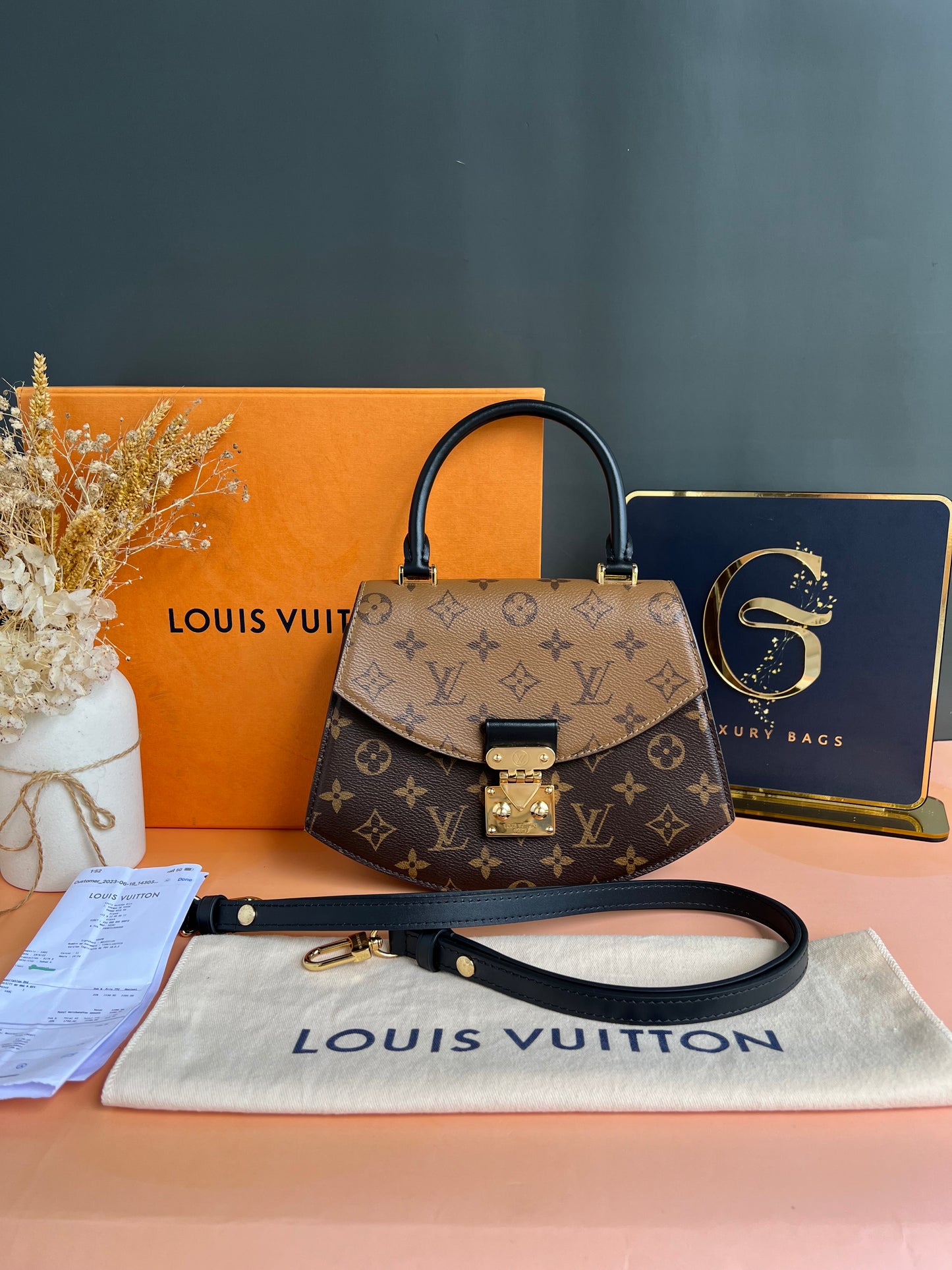 LOUIS VUITTON TILSITT REVERSE MONOGRAM