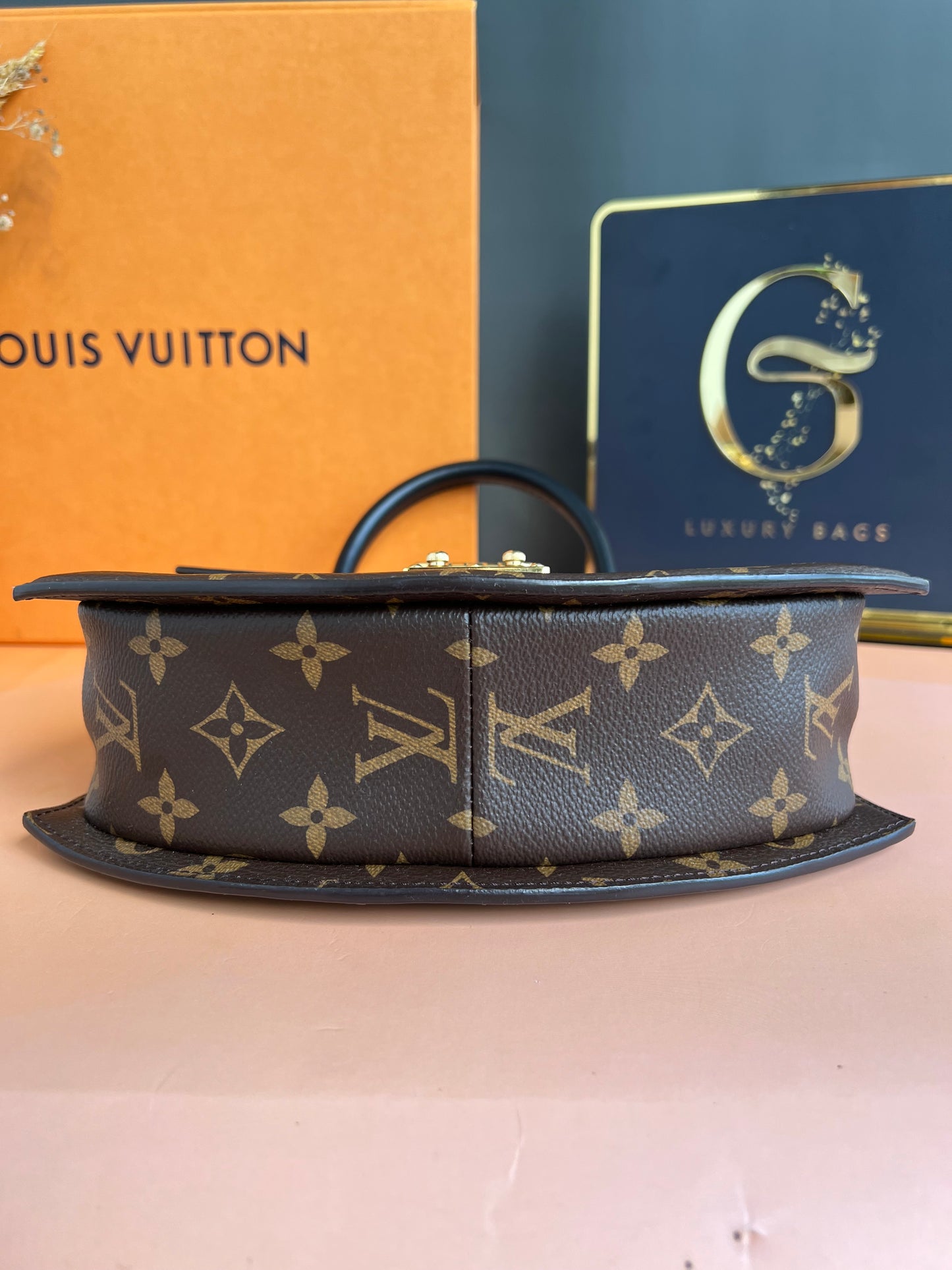 LOUIS VUITTON TILSITT REVERSE MONOGRAM