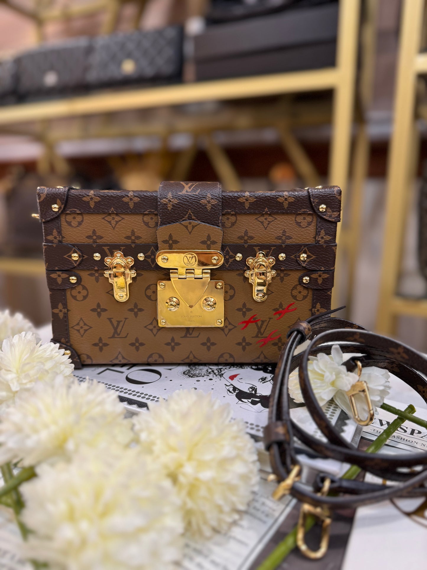 LOUIS VUITTON TRUNK CLUTCH REVERSE