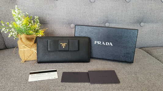 Prada bow zippy long wallet
